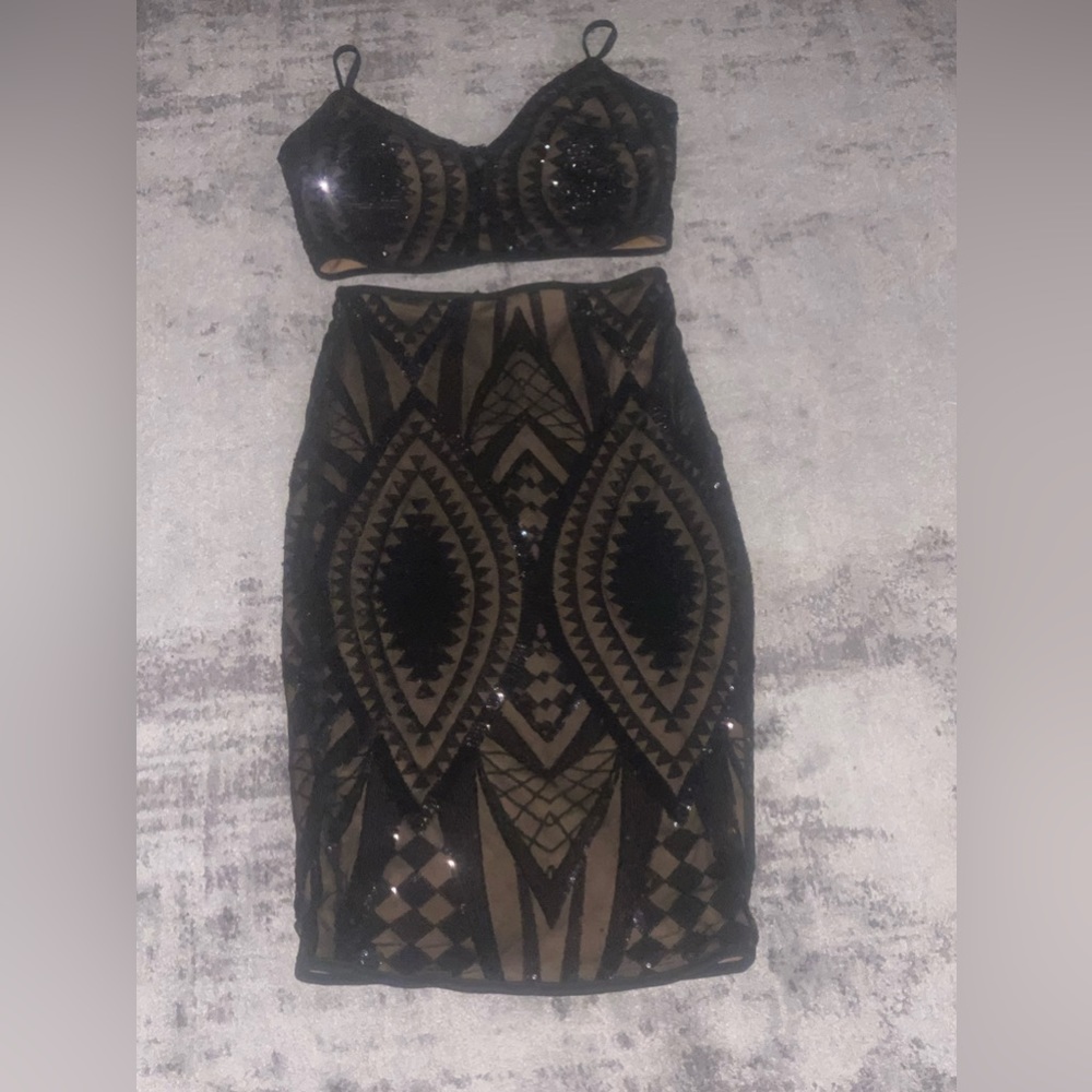 Black two piece outfit.